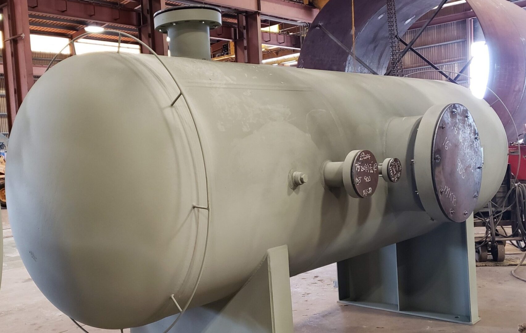 A large metal tank sitting in the middle of a room.