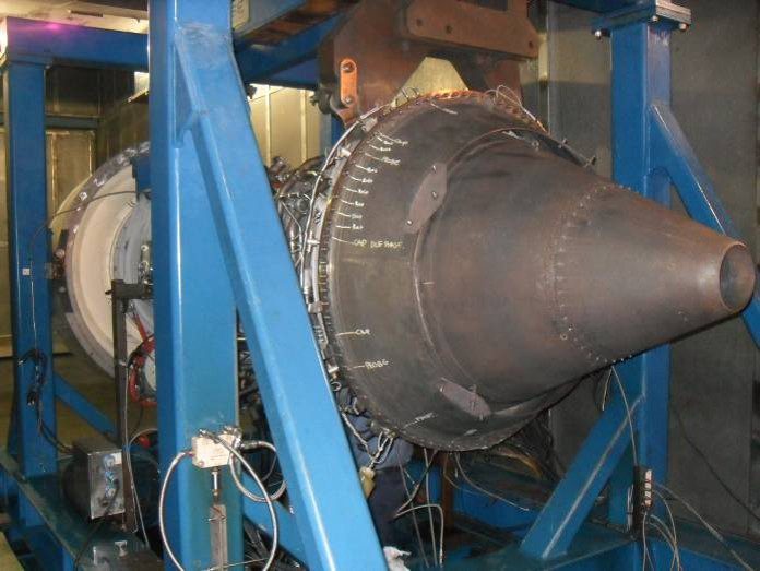 Jet engine mounted on blue test rig